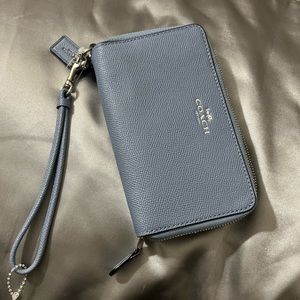 Light blue Coach wristlet wallet